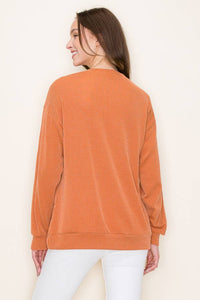 Burnt orange ribbed Texas graphic top
