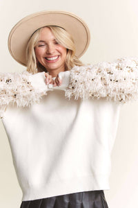 Off white sweater top with faux fur sequin sleeves