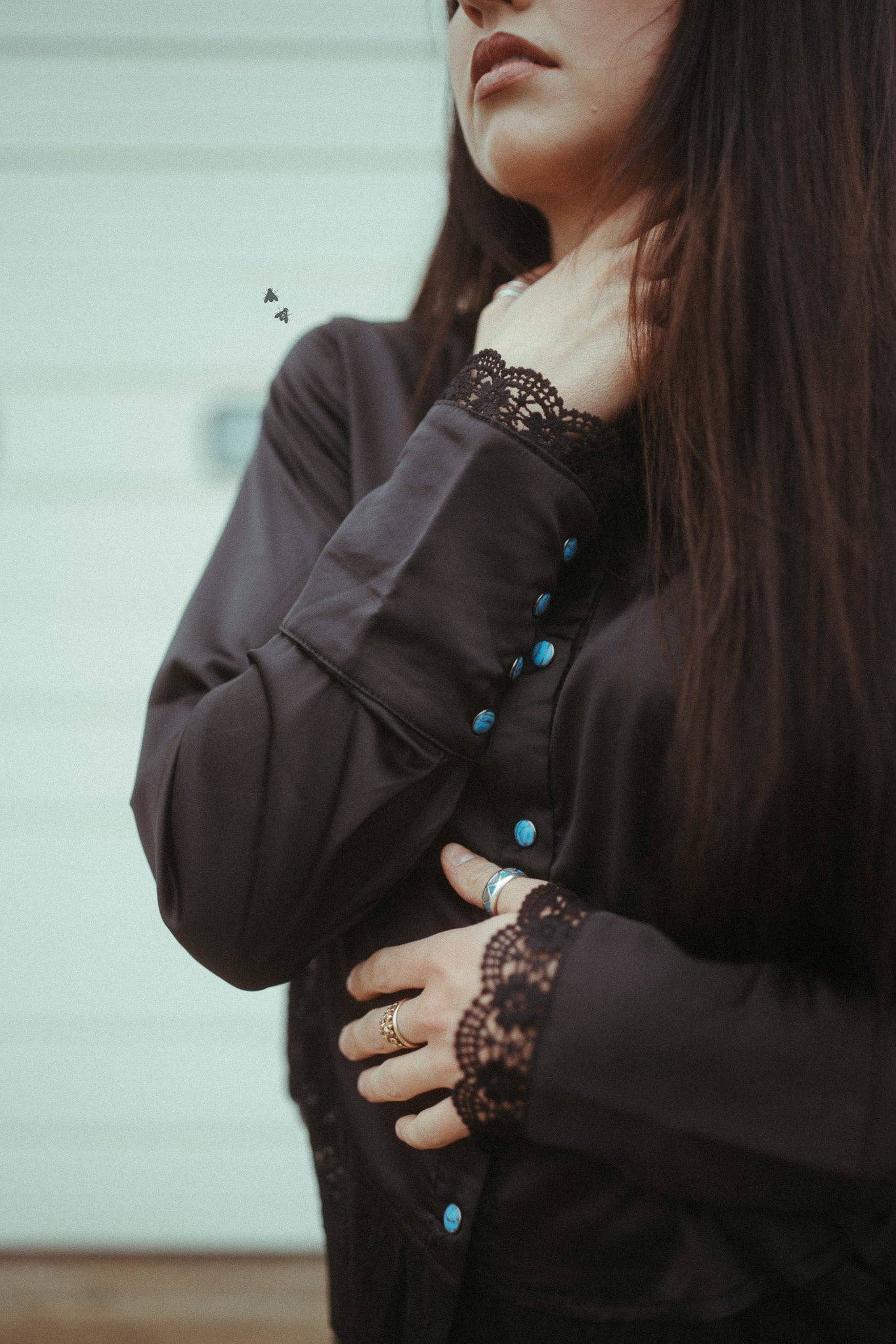 Black long sleeve top with lace hem