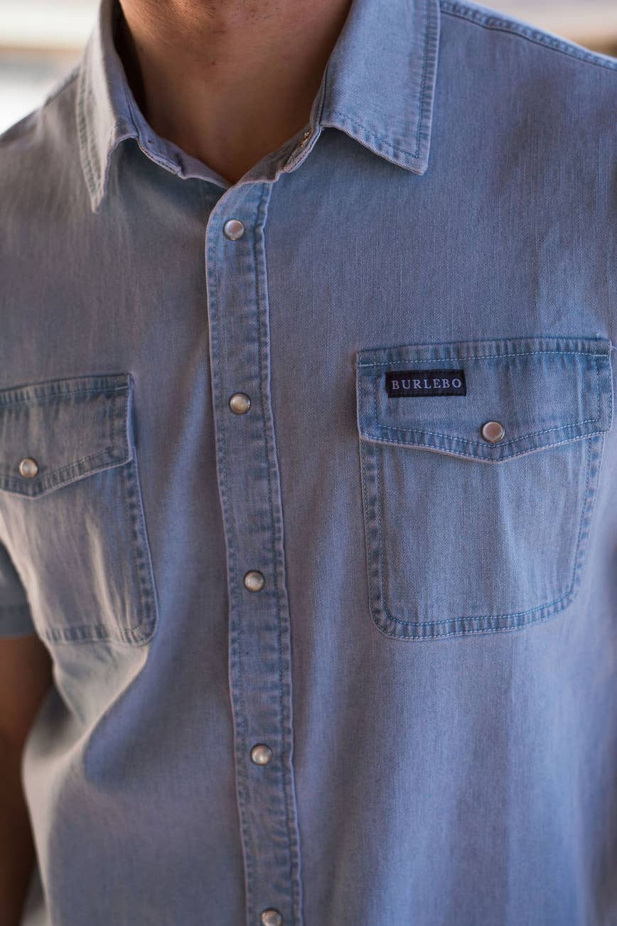 Light washed denim pearl snap shirt