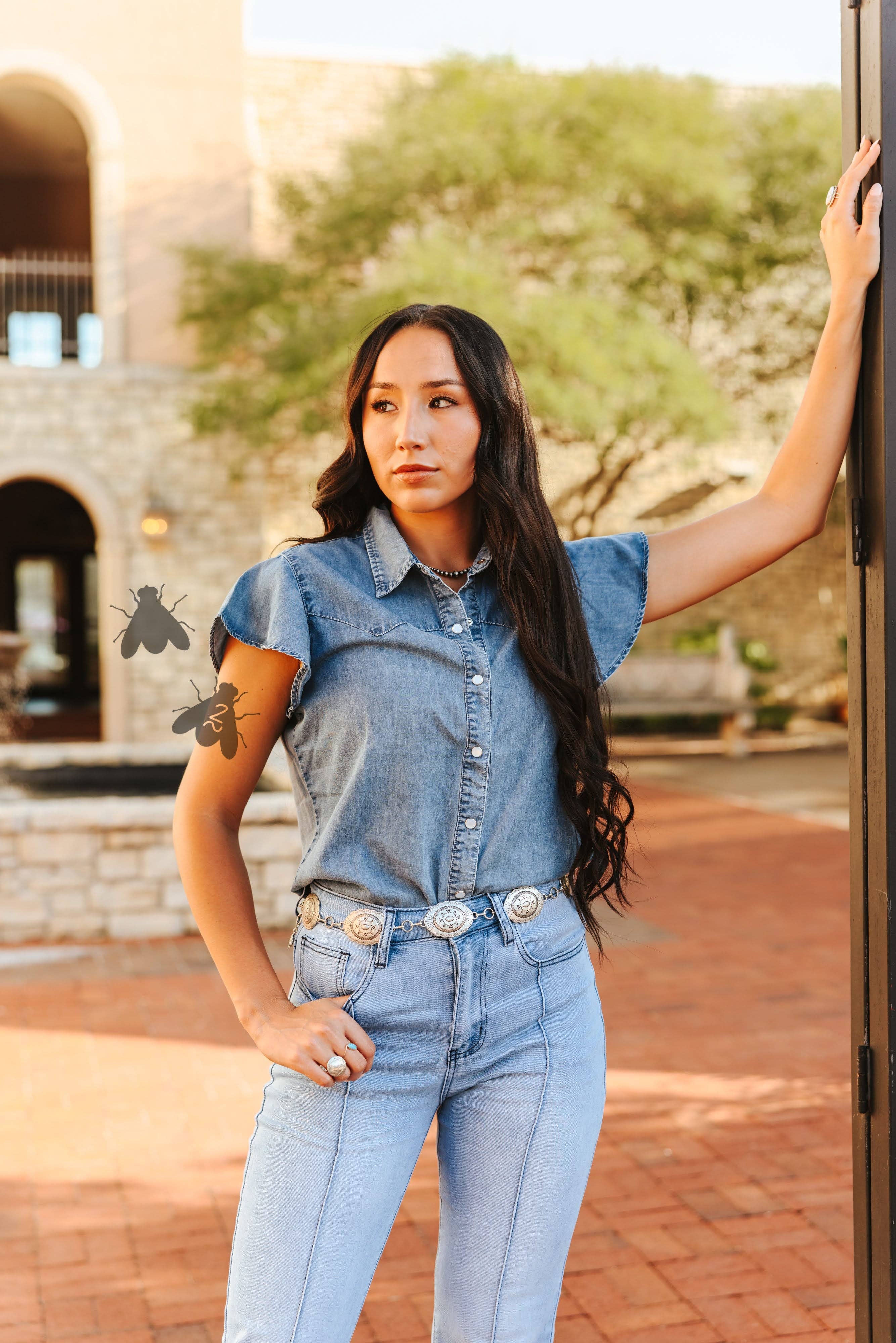 Denim top with pearl snap buttons