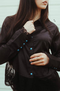 Black long sleeve top with lace hem