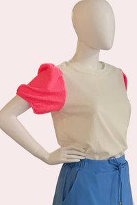 White textured top with neon pink puff sleeves