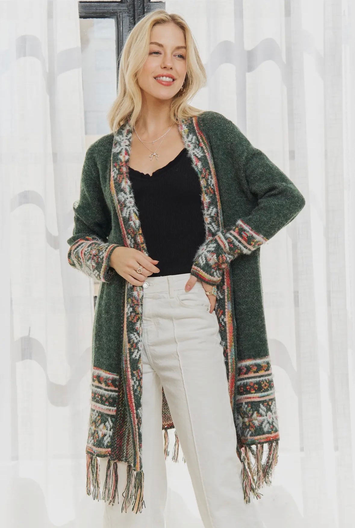 Green cardigan with fringe hem