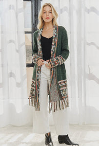 Green cardigan with fringe hem