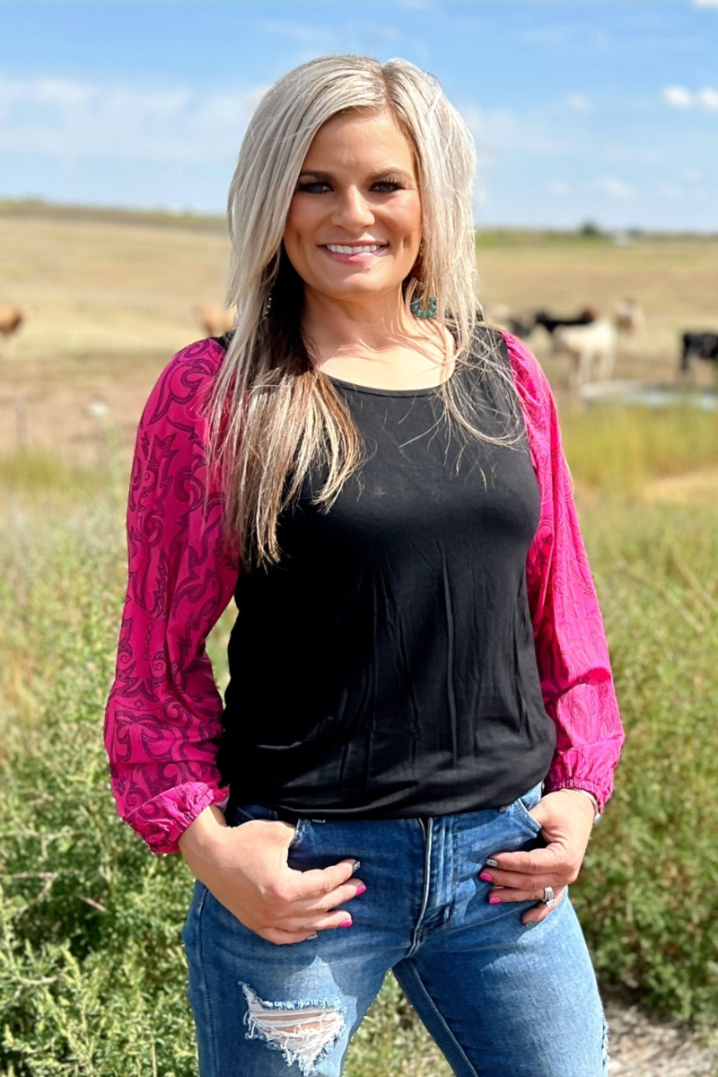 Black top with pink bubble sleeves