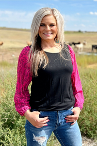 Black top with pink bubble sleeves