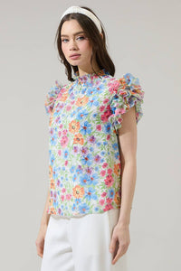 Floral mock neck ruffle blouse