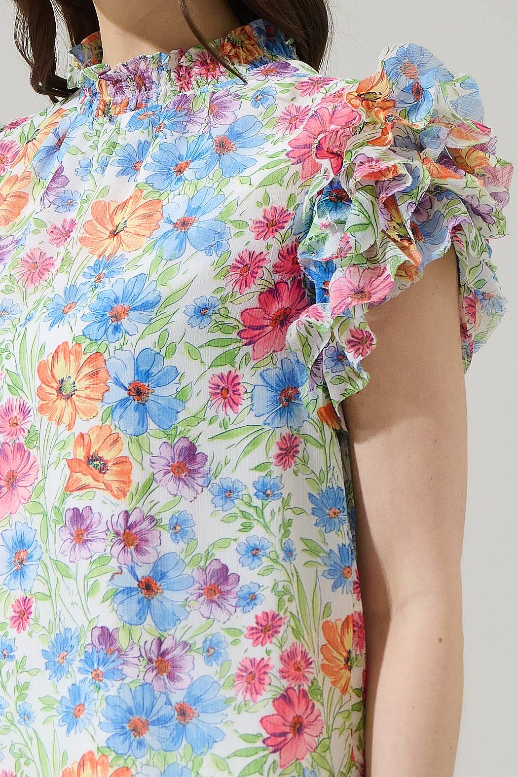 Floral mock neck ruffle blouse