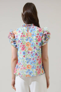 Floral mock neck ruffle blouse