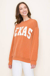 Burnt orange ribbed Texas graphic top
