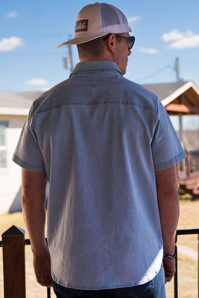 Light washed denim pearl snap shirt