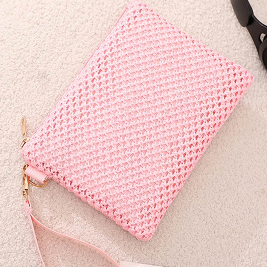 Pink woven wrist strap purse