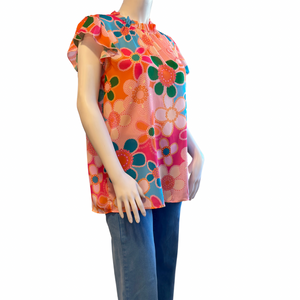 Floral print top with ruffled neckline and flutter sleeves