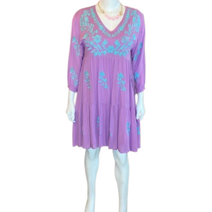 Lilac dress with teal embroidery