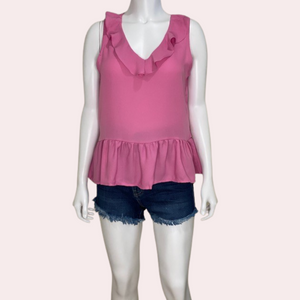 Pink top with ruffle hem and neckline